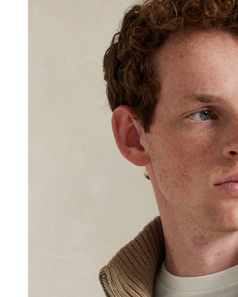 This classic mockneck jumper is knit from soft combed cotton and finished with the iconic Polo Pony.