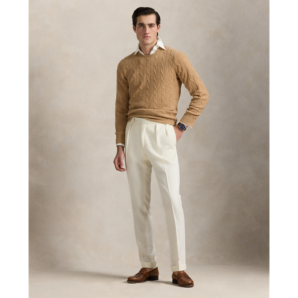 Our unisex cable-knit jumper is a Polo staple dating all the way back to 1973. What hasn't changed is the quality – 100% Italian cashmere – and the seamless way it is knit together. Known as hand-linking, this technique gives the piece an unmistakably attractive shape and soft feel.