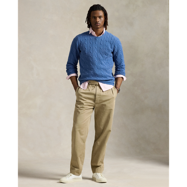 Our unisex cable-knit jumper is a Polo staple dating all the way back to 1973. What hasn't changed is the quality – 100% Italian cashmere – and the seamless way it is knit together. Known as hand-linking, this technique gives the piece an unmistakably attractive shape and soft feel.