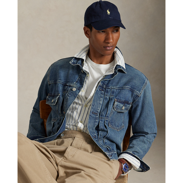 The oxford shirt made its debut very early in  Ralph Lauren Lauren’s designs, and since then, it has solidified its status as a pillar of the Polo look. Today, Mr Lauren continues to create countless variations of his iconic shirt, including this trim version, which is finished with a multicoloured signature embroidered Pony.