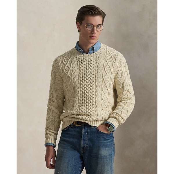 The distinctive patterns that define the classic Aran jumper – a style favoured by 19th-century Irish fishermen for its unparalleled warmth and hard-wearing construction – were originally knit to signify the wearer's family clan. Polo's all-cotton version symbolises the wearer's membership in a different type of group: those who appreciate form, function and enduring style.