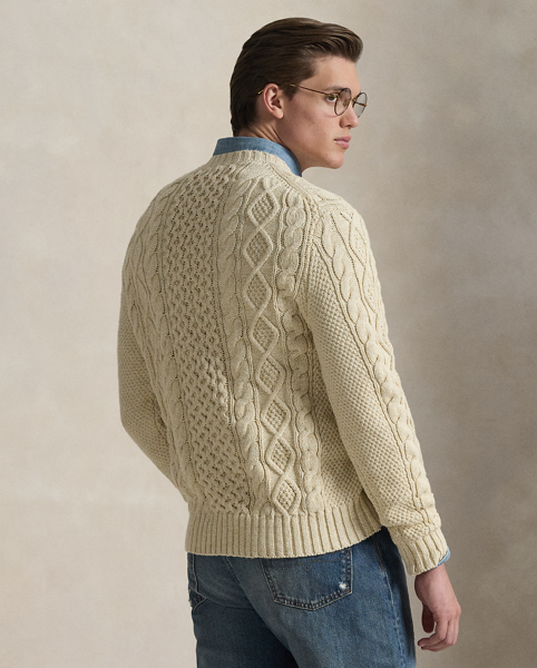 The distinctive patterns that define the classic Aran jumper – a style favoured by 19th-century Irish fishermen for its unparalleled warmth and hard-wearing construction – were originally knit to signify the wearer's family clan. Polo's all-cotton version symbolises the wearer's membership in a different type of group: those who appreciate form, function and enduring style.