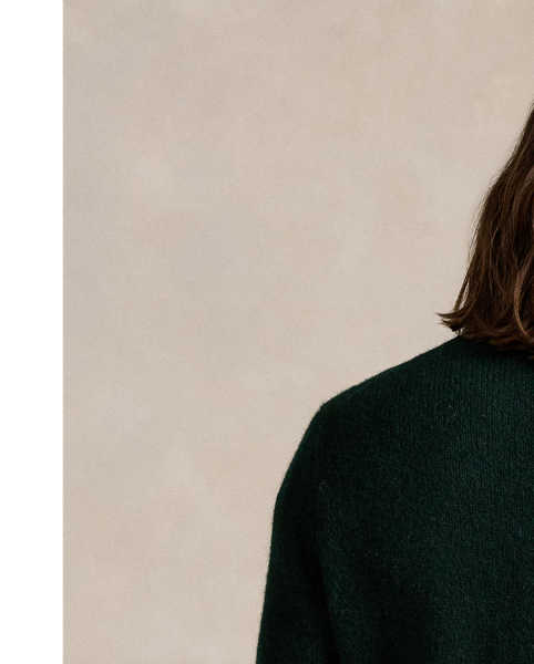 This crewneck jumper is knit from a blend that includes wool and alpaca hair for a soft, fuzzy feel.