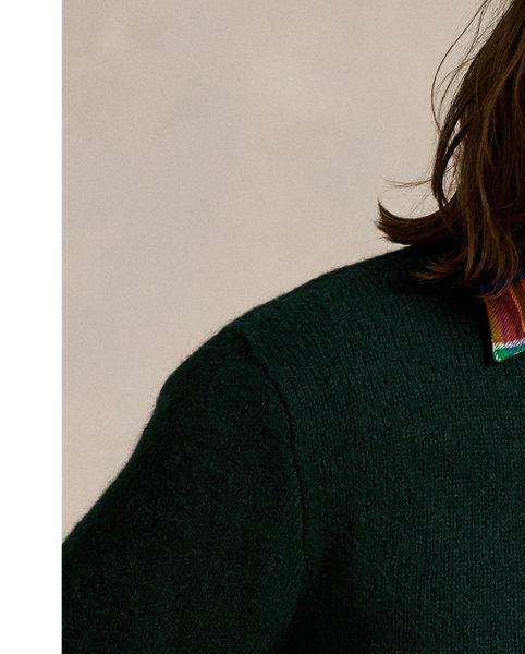 This crewneck jumper is knit from a blend that includes wool and alpaca hair for a soft, fuzzy feel.