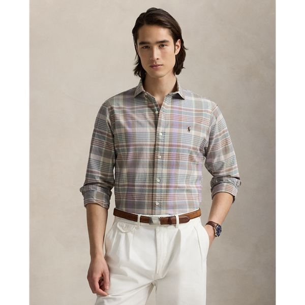 The oxford shirt made its debut at the beginning of the  Ralph Lauren Lauren brand, and since then it has solidified its status as a pillar of the Polo look. Today, Mr. Lauren continues to design countless variations of his iconic shirt, including this tattersall version that is finished with our multicoloured signature Pony.