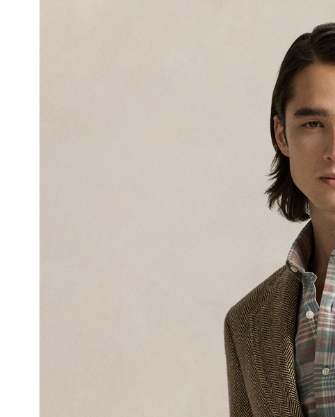 The oxford shirt made its debut at the beginning of the  Ralph Lauren Lauren brand, and since then it has solidified its status as a pillar of the Polo look. Today, Mr. Lauren continues to design countless variations of his iconic shirt, including this tattersall version that is finished with our multicoloured signature Pony.