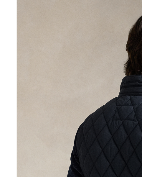 This gilet is crafted from water-repellent fabric and finished with a logo label for a signature Polo touch.