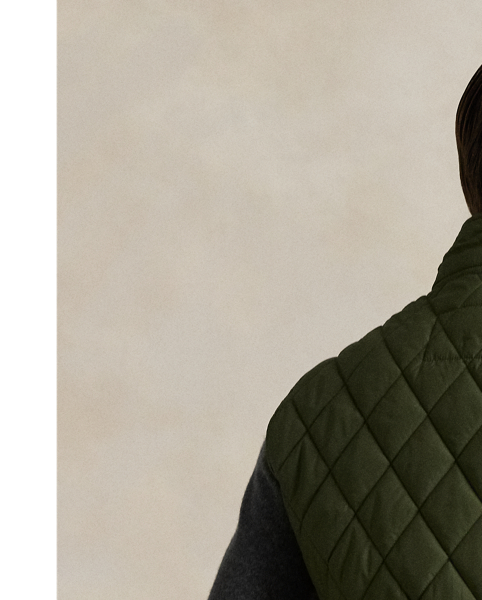 This gilet is crafted from water-repellent fabric and finished with a logo label for a signature Polo touch.