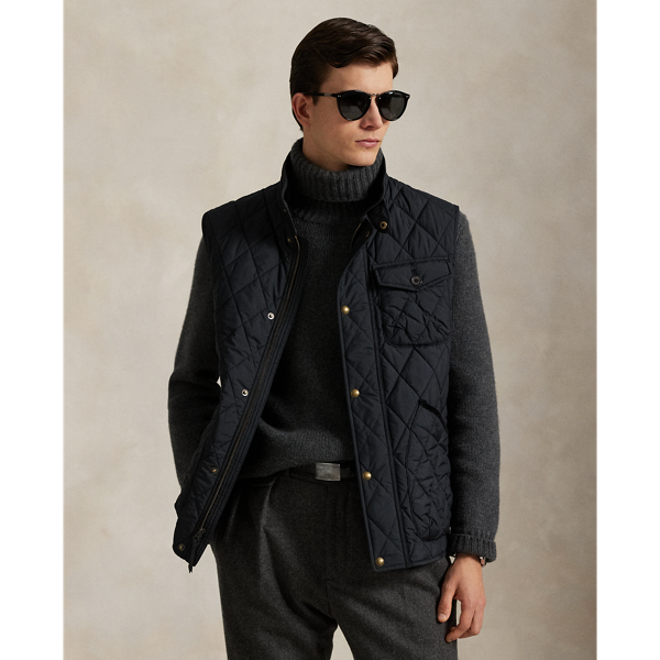 This gilet is crafted from water-repellent fabric and finished with a logo label for a signature Polo touch.