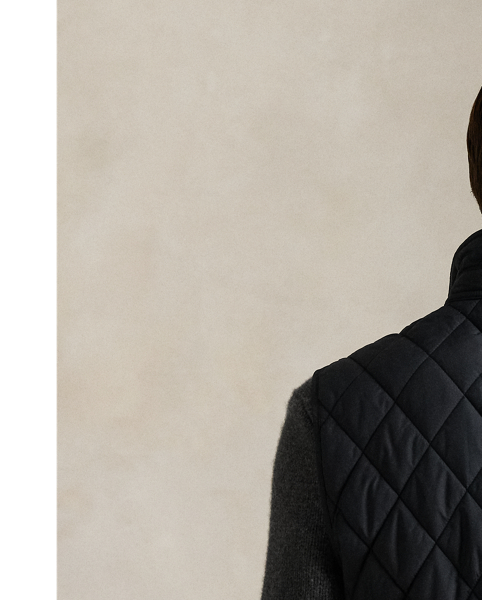 This gilet is crafted from water-repellent fabric and finished with a logo label for a signature Polo touch.