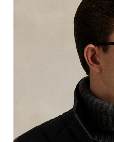 This gilet is crafted from water-repellent fabric and finished with a logo label for a signature Polo touch.