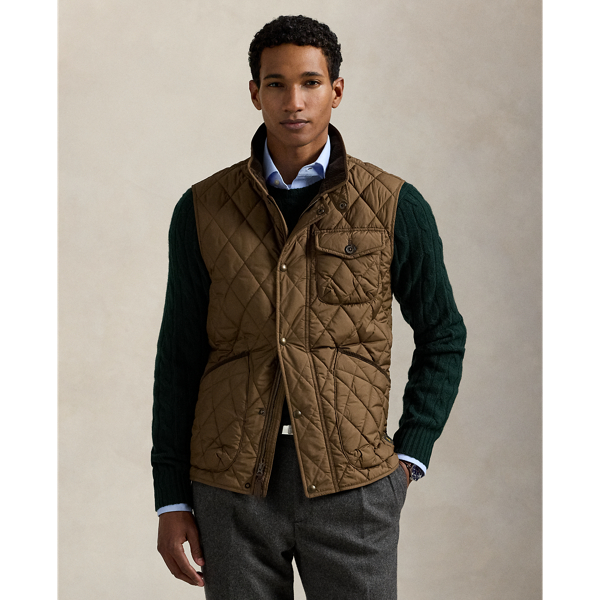 This gilet is crafted from water-repellent fabric and finished with a logo label for a signature Polo touch.
