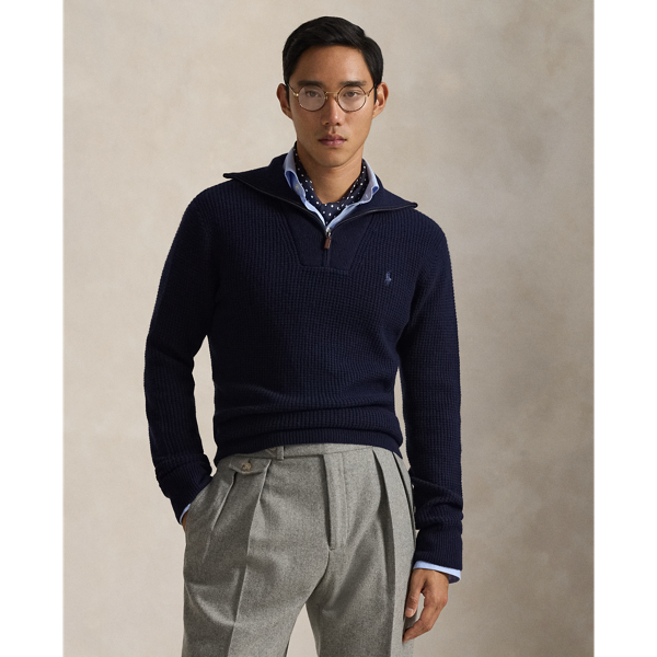 Inspired by a vintage surplus jumper, this layer contrasts a textured waffle-knit technique with rib-knit detailing.