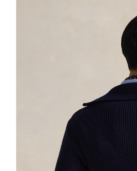 Inspired by a vintage surplus jumper, this layer contrasts a textured waffle-knit technique with rib-knit detailing.