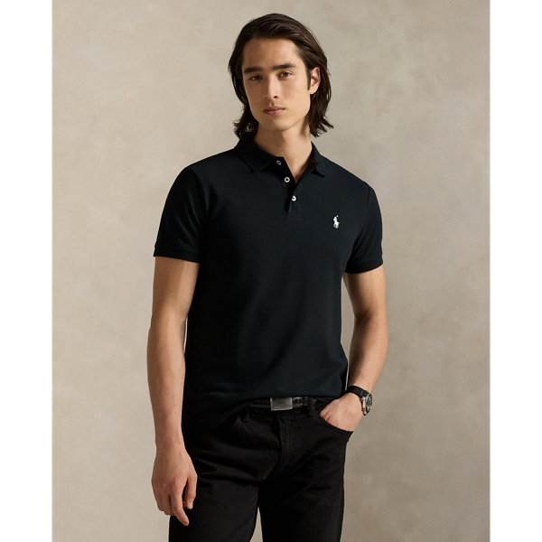 An American style standard since 1972, the Polo shirt has been imitated but never matched. Over the decades, Ralph Lauren Lauren has re-imagined his signature style in a wide array of colours and fits, yet all retain the quality and attention to detail of the iconic original. This version includes a hint of stretch, allowing for unparalleled comfort and ease of movement. It is finished with genuine mother-of-pearl buttons on the placket.