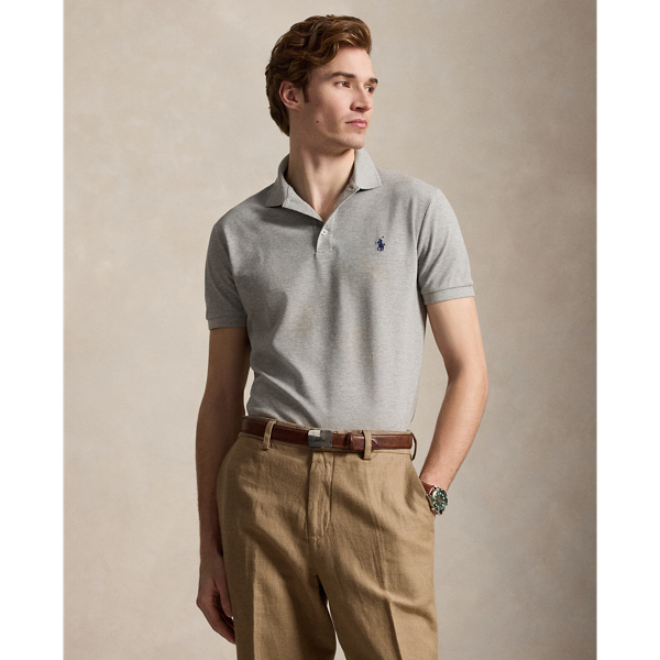 An American style standard since 1972, the Polo shirt has been imitated but never matched. Over the decades, Ralph Lauren Lauren has re-imagined his signature style in a wide array of colours and fits, yet all retain the quality and attention to detail of the iconic original. This version includes a hint of stretch, allowing for unparalleled comfort and ease of movement. It is finished with genuine mother-of-pearl buttons on the placket.