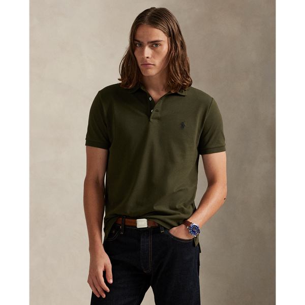 An American style standard since 1972, the Polo shirt has been imitated but never matched. Over the decades, Ralph Lauren Lauren has re-imagined his signature style in a wide array of colours and fits, yet all retain the quality and attention to detail of the iconic original. This version includes a hint of stretch, allowing for unparalleled comfort and ease of movement. It is finished with genuine mother-of-pearl buttons on the placket.