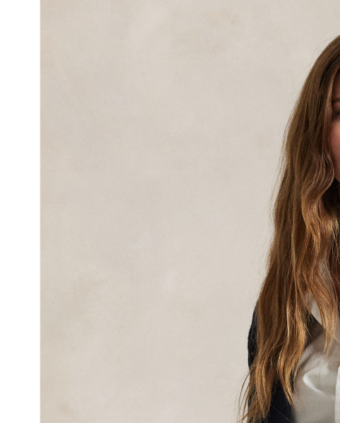 Using luxurious Italian cashmere, we have reinterpreted the silhouette of our iconic Polo blazer as a knit unisex cardigan. Signature gold-tone buttons complete the classic look.