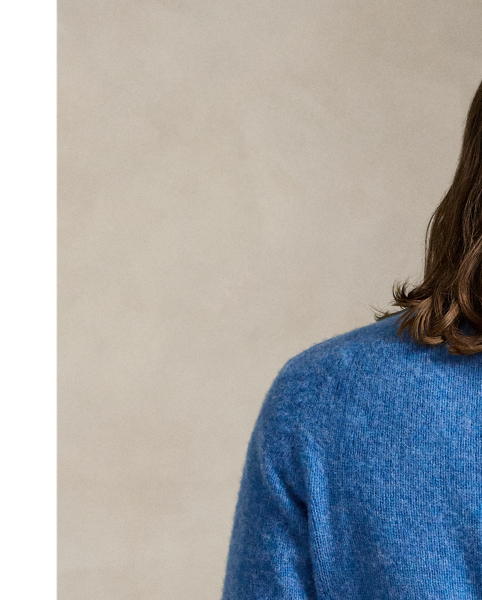 Available in an array of bright colours, this jumper is made in Scotland using thick-gauge wool yarn and a seamless circular-knitting technique.