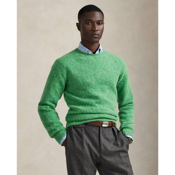 Available in an array of bright colours, this jumper is made in Scotland using thick-gauge wool yarn and a seamless circular-knitting technique.