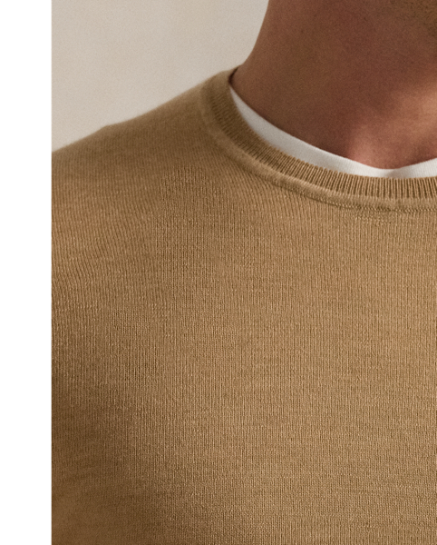 Finished with our signature embroidered Pony, this lightweight jumper is finely knit with wool yarn from Italy that is Machine washable and worsted for a smooth texture.