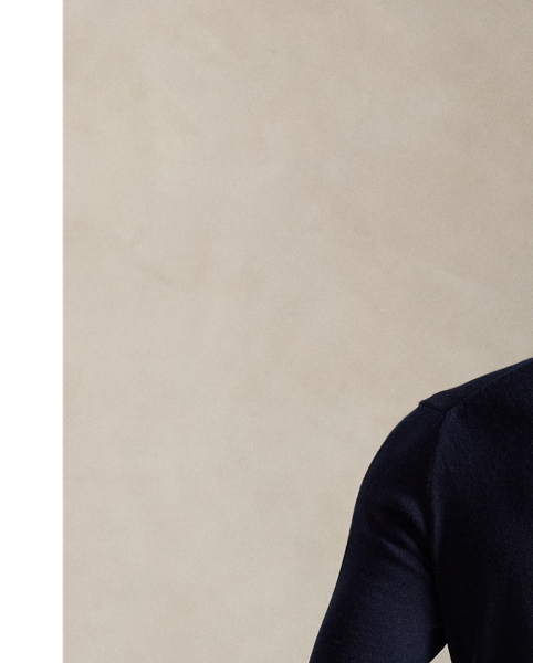 This lightweight jumper’s Italian wool yarn is treated for easy care and worsted for durability as well as a fine, smooth texture.