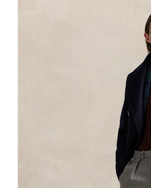 This lightweight jumper’s Italian wool yarn is treated for easy care and worsted for durability as well as a fine, smooth texture.