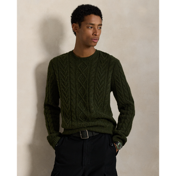 The distinctive patterns that define the classic Aran jumper – a style favoured by 19th-century Irish fishermen for its unparalleled warmth and hard-wearing construction – were originally knit to signify the wearer's family clan. Polo's version, which is made with a wool-and-alpaca hair blend, symbolises the wearer's membership in a different type of group: those who appreciate form, function and enduring style.