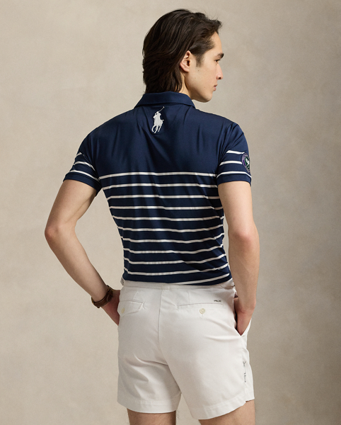 Part of our collection celebrating Wimbledon 2025, this striped Polo shirt was designed exclusively for the tournament's ballperson uniform. Its stretch jersey fabric features moisture-wicking properties to help keep you cool and comfortable.