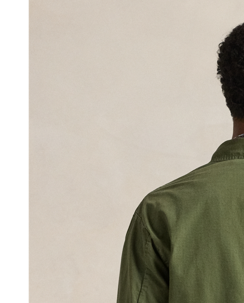 This overshirt merges durable cotton ripstop with a utilitarian-inspired silhouette and a special wash treatment that creates a distressed effect.