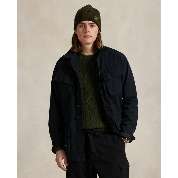 This overshirt merges durable cotton ripstop with a utilitarian-inspired silhouette and a special wash treatment that creates a distressed effect.