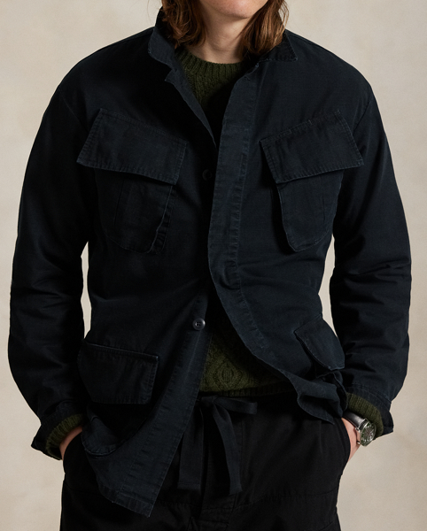 This overshirt merges durable cotton ripstop with a utilitarian-inspired silhouette and a special wash treatment that creates a distressed effect.