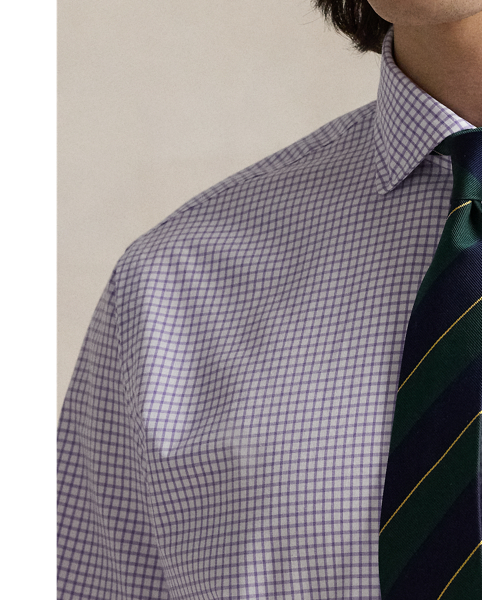 This shirt is crafted from silky cotton poplin and features an elegant Glen plaid pattern.