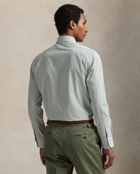This shirt is crafted from silky cotton poplin and features an elegant Glen plaid pattern.