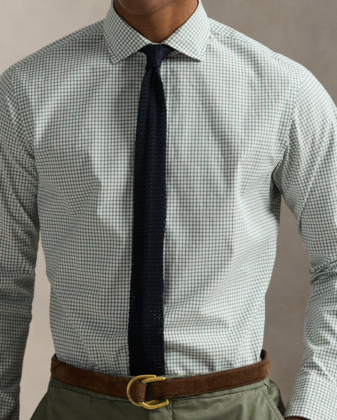 This shirt is crafted from silky cotton poplin and features an elegant Glen plaid pattern.