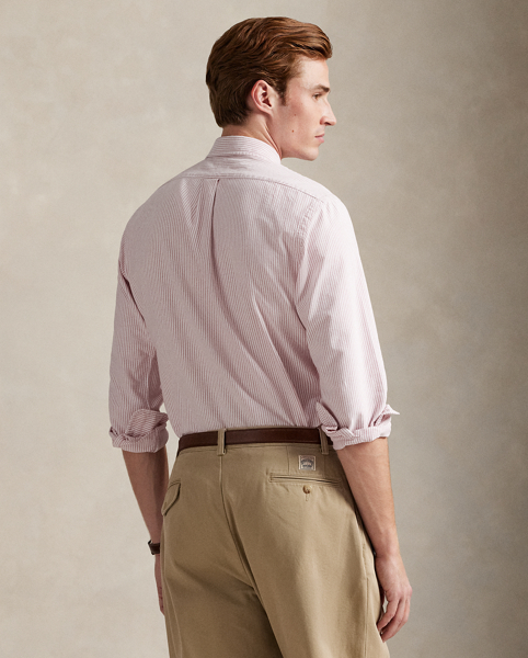 The oxford shirt made its debut very early in Ralph Lauren Lauren’s designs, and since then, it has solidified its status as a pillar of the Polo look. Today, Mr Lauren continues to create countless variations of his iconic shirt, including this striped version, which is embroidered with our multicoloured signature Pony.