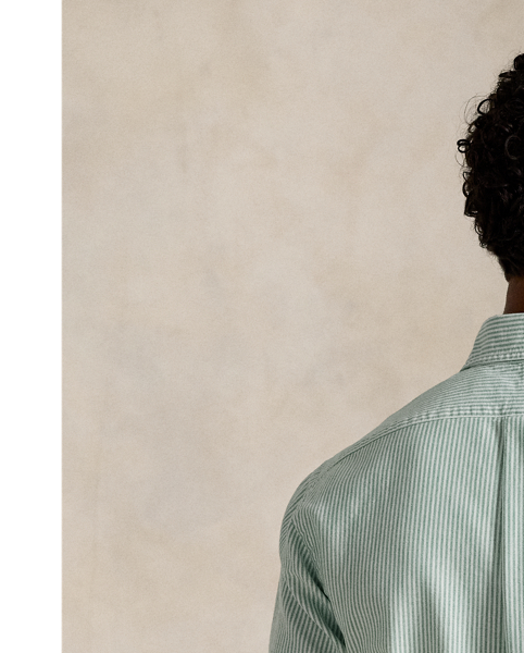 The oxford shirt made its debut very early in  Ralph Lauren Lauren’s designs, and since then, it has solidified its status as a pillar of the Polo look. Today, Mr Lauren continues to create countless variations of his iconic shirt, including this striped version, which is embroidered with our multicoloured signature Pony.