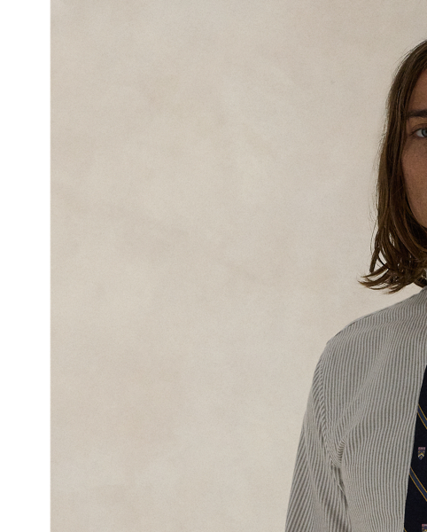 The oxford shirt made its debut very early on in  Ralph Lauren Lauren’s designs and, since then, it has solidified its status as a pillar of the Polo look. Today, Mr Lauren continues to create countless variations of his iconic shirt, including this striped version, which is embroidered with our multicoloured signature Pony.