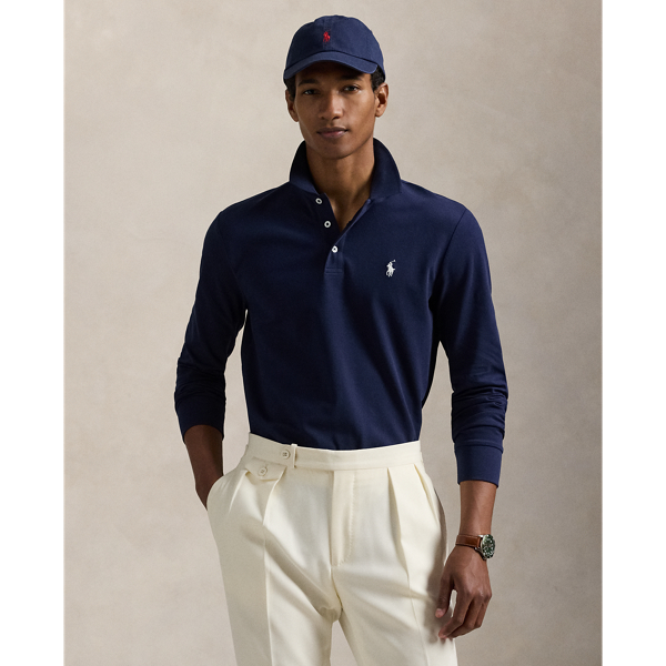 An American style standard since 1972, the Polo shirt has been imitated but never matched. Over the decades, Ralph Lauren Lauren has re-imagined his signature style in a wide array of colours and fits, yet all retain the quality and attention to detail of the iconic original. This version includes a hint of stretch, allowing for unparalleled ease of movement and comfort.