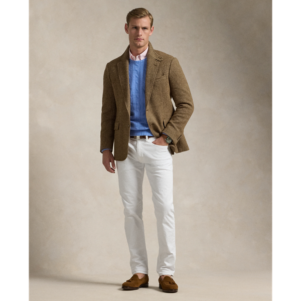 The slim-leg Sullivan features a regular rise and a trim fit through the seat, thigh and knee. This version combines cotton with a hint of stretch for ease of movement. It features our signature embroidered Pony on the back pocket.