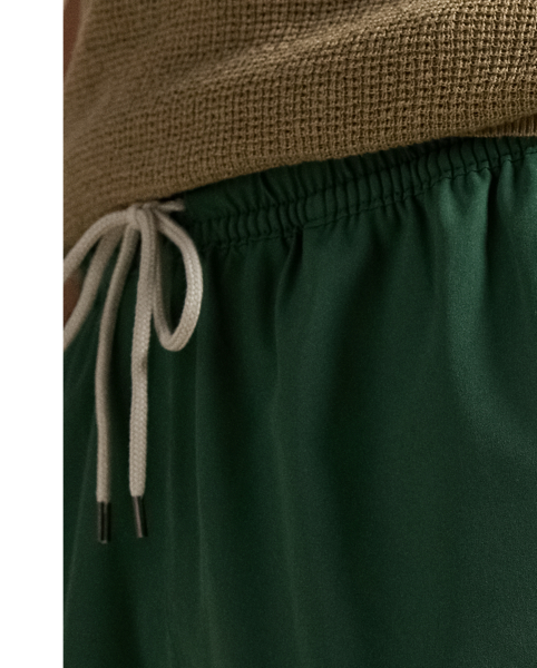 These mesh-lined swimming trunks are woven with extra stretch and feature our signature embroidered Pony.