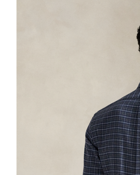 This plaid shirt is crafted from a stretchy brushed twill fabric, which wicks away moisture so you can stay cool and comfortable throughout the day.