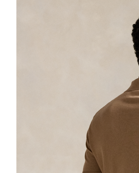 This short-sleeve jumper combines the silhouette of our signature Polo shirt with one of the highest quality cottons in the world known as Suvin, which provides a soft, silky and luxurious texture. The fine-gauge yarn is sourced from an Italian mill specialising in this fibre. It is finished with genuine mother-of-pearl buttons on the placket.