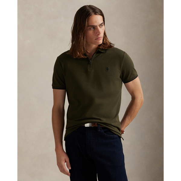 An American style standard since 1972, the Polo shirt has been imitated but never matched. Over the decades, Ralph Lauren Lauren has reimagined his signature style in a wide array of colours and fits, yet all retain the quality and attention to detail of the iconic original. This textured version includes a hint of stretch, allowing for unparalleled ease of movement and comfort.