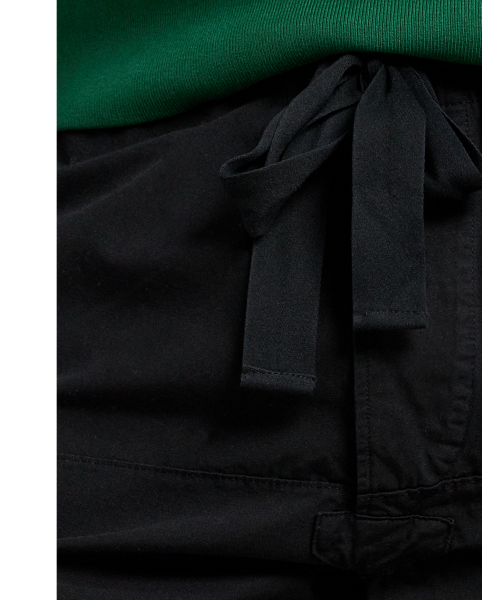 These shorts draw inspiration from a pair of a vintage surplus trousers from the mid-1950s and are made with lightweight cotton canvas.