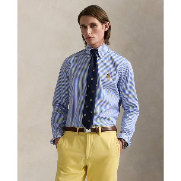 This striped shirt is crafted from lightweight cotton poplin and embroidered with a signature shield crest.
