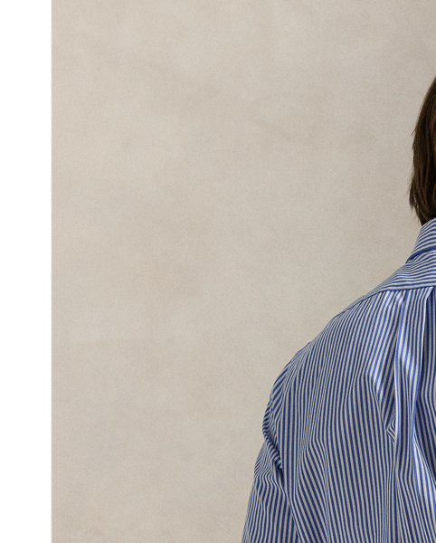 This striped shirt is crafted from lightweight cotton poplin and embroidered with a signature shield crest.