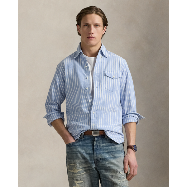 The oxford shirt made its debut very early in Ralph Lauren Lauren’s designs, and since then, it has solidified its status as a pillar of the Polo look. Our fabric is developed with a secret wash, which gives it instant character, ease and a heathered softness. The formula is so unique that it's been kept in a safe for more than three decades. In addition to details evoking its prep-school inspiration, it offers a relaxed feel, producing what we refer to as "the perfect rumple." Today, Mr Lauren continues to create countless variations of his iconic shirt, including this striped version that is finished with our signature embroidered Pony.