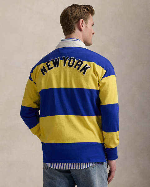 As a boy growing up in the Bronx, Mr Lauren loved going to Yankee Stadium™ to watch his hometown heroes play ball. This unisex rugby shirt celebrates Mr Lauren's long-standing love of the Bronx Bombers™ and the game of baseball with a New York Yankees™ logo patch. Made from striped cotton jersey, it features our signature embroidered Pony and appliqués spelling out "New York".