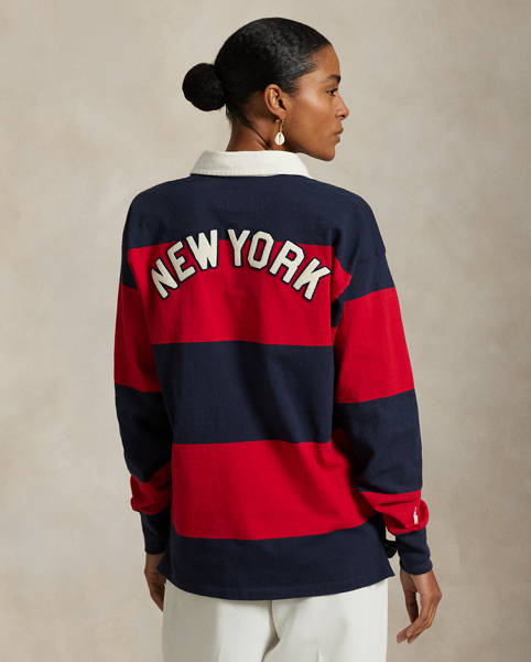 As a boy growing up in the Bronx, Mr Lauren loved going to Yankee Stadium™ to watch his hometown heroes play ball. This unisex rugby shirt celebrates Mr Lauren's long-standing love of the Bronx Bombers™ and the game of baseball with a New York Yankees™ logo patch. Made from striped cotton jersey, it features our signature embroidered Pony and appliqués spelling out "New York".
